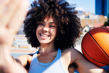 Image showing Basketball court, fashion and selfie portrait of black woman with trendy outfit, urban style and edgy clothes. Sports, fitness and hand frame of girl with ball for freedom, energy and happy in city