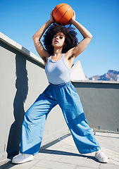 Image showing Basketball model, fashion and black woman in city with confidence, feminist and armpit hair. Sports, fitness and portrait of girl outdoors with ball in trendy outfit, urban style and edgy clothes