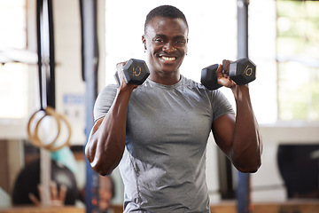 Image showing Fitness, weights and portrait of a black man lifting for muscle, training and power in the gym. Smile, strong and African athlete doing a workout, exercise or sports for body building and cardio