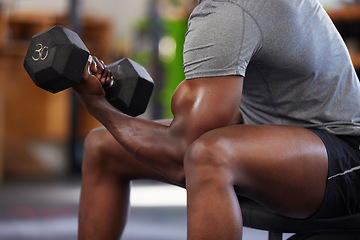 Image showing Dumbbell, power and black man doing a workout in the gym for intense arm strength training. Sports, motivation and strong African male bodybuilder doing a exercise with weights in a sport center.