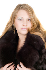 Image showing Portrait of the beautiful young lady in a fur coat