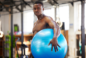 Image showing Black man, exercise ball and gym portrait for fitness, training and workout. Sports or athlete person train for health and wellness or strong power, energy and bodybuilder muscle growth goals