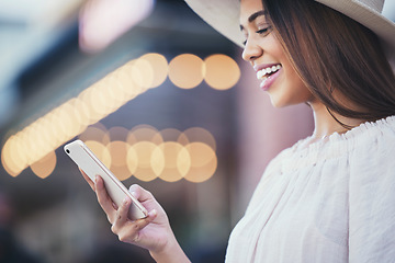 Image showing Woman, phone and smile for social media with in the city for communication, travel or conversation. Happy female smiling for discussion, traveling or online 5G connection on smartphone in urban town