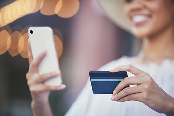 Image showing Woman, hands and phone with credit card for online shopping, ecommerce or purchase in the city. Hand of happy female shopper holding smartphone for internet banking app, 5G connection or transaction