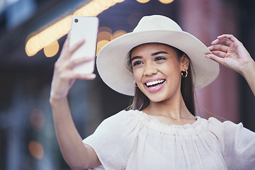 Image showing Woman, social media and smile for selfie in the city for vlogging, travel or profile picture and memories. Happy female influencer smiling for vlog, traveling or online 5G connection in an urban town