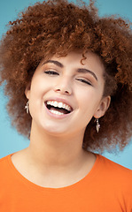 Image showing Portrait, black woman and smile for achievement, celebration and confident girl on blue studio background. Face, happy African American female and lady with happiness, joyful or cheerful with success