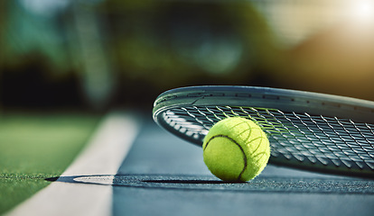 Image showing Tennis ball, racket and court ground with mockup space, blurred background or outdoor sunshine. Summer, sports equipment and mock up for training, fitness and exercise at game, contest or competition