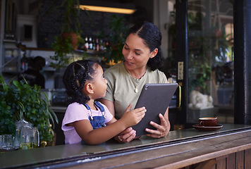 Image showing Streaming, cafe and woman and girl with a tablet talking while on social media, online and app at a coffee shop. Kid, daughter and child with mother on the internet for browsing the web or website