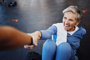 Image showing Senior woman, fitness and personal trainer with support and happy workout, exercise and muscle health on gym floor. Helping hand, coaching and elderly person with training sports for retirement care