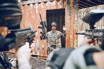 Image showing Paintball, man surrender with soldier and gun, battlefield and fitness with military mission and lose game. Sport, camouflage and army outdoor with loss, player caught and aim at target with war