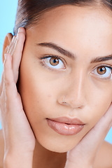 Image showing Portrait, skincare or woman with dermatology, cosmetics or lady on blue studio background. Face detox, female or girl with makeup, morning routine or salon treatment with grooming, clear or soft skin