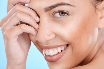 Image showing Skincare, portrait and woman in studio for beauty, wellness and cosmetics grooming on blue background. Face, facial and girl model relax in luxury, collagen or dermatology, skin or routine isolated