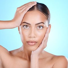 Image showing Portrait, beauty and skincare with a model black woman in studio on a blue background for wellness. Face, skin and makeup with an attractive young female posing for natural treatment or cosmetics