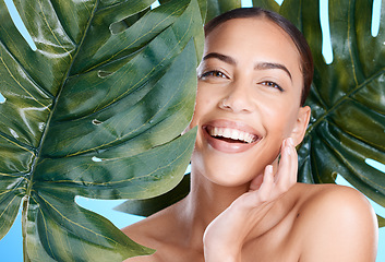 Image showing Woman, green plant and beauty portrait of face happy about natural dermatology cosmetics. Person with spa leaf skincare product benefits or makeup for self care, skin glow and facial wellness