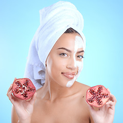 Image showing Beauty, pomegranate and face mask portrait of woman natural dermatology skincare cosmetics. Aesthetic model person with sustainable fruit product for self care, skin glow and facial blue background