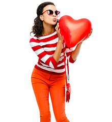 Image showing Woman, kiss or balloon heart on isolated white background for valentines day, romance or love. Model, face or kissing emoji expression and inflatable romantic toy, trendy or fashion clothes on mockup