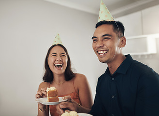 Image showing Love, couple eating cake and birthday party with smile, loving and celebration for achievement and joyful. Romantic, man and woman with hats, dessert and laughing together in living room and cheerful