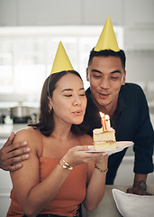 Image showing Birthday, party and couple with candles on cake enjoying celebration, special day and anniversary together. Love, dating and man and woman blow flame on dessert, sweet treat and celebrate happiness