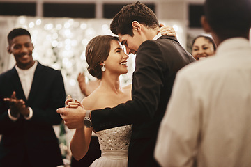 Image showing Love, wedding and happy couple doing a dance together for tradition at a marriage reception. Happiness, smile and young husband and wife dancing with intimacy at ceremony party, event or celebration.