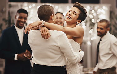 Image showing Wedding, diversity and dance with a lesbian couple in celebration of their union together at a ceremony of tradition. LGBT, woman or love with a female and partner dancing after being married