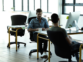 Image showing Businessman, startup partnership and chat at desk with discussion, advice and conversation at workplace. Entrepreneur group, team building and talk in office with friends, planning and company goals