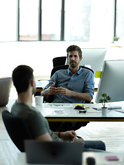 Image showing Businessman, startup partnership and talking friends at desk with collaboration, advice or planning at workplace. Entrepreneur group, teamwork and chat in office with support, vision or company goals