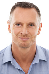 Image showing Portrait, face and man with smile looking happy, calm and content isolated against a studio white background. Businessman, entrepreneur or employee confident, handsome and proud wearing a shirt