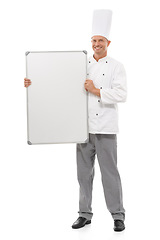 Image showing Board mockup and chef man isolated on a white background of empty menu and happy career services. Professional culinary, cooking or bakery person whiteboard, presentation and ideas in studio portrait