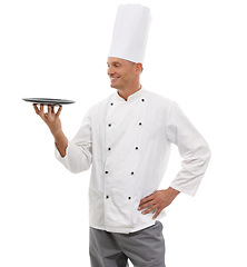 Image showing Chef, empty plate and smile, presenting menu special promo deal or restaurant product placement space. Happy cafe, cook and man in service uniform with mock up isolated on white background in studio.