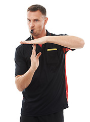 Image showing Sports, timeout and man referee in studio blowing a whistle for soccer match or training. Fitness, rules and mature male coach with hand football gesture or sign language isolated by white background