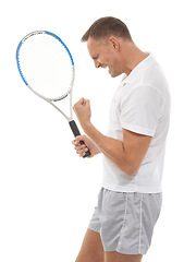 Image showing Tennis sports, winner and celebration of man in studio isolated on white background. Winning competition, achievement and mature male athlete with racket celebrating goals, targets or success victory