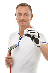 Image showing Sports ball, golf and man in studio isolated on a white background ready to start game. Training, golfer and mature male athlete holding club driver for golfing workout, exercise and fitness match.