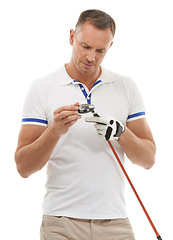 Image showing Sports, golf man and inspection of club in studio isolated on a white background ready to start game. Training, golfer and mature male checking driver for golfing workout, exercise and fitness match