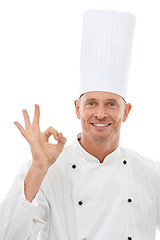 Image showing Man, chef and OK hand sign with smile for perfection, approval or precision isolated on a white studio background. Portrait of happy culinary artist showing gesture for perfect, precise or like emoji