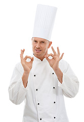 Image showing Man, chef and hands in OK sign for perfection, approval or precision isolated on a white studio background. Portrait of happy culinary artist showing hand gesture for perfect, precise or just right