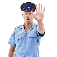 Image showing Police, stop and officer or law enforcement with legal authority isolated against a studio white background. Man, cop and person with uniform for public service for safety and protection