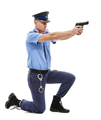 Image showing Man, police officer and pointing gun ready to fire or shoot isolated on a white studio background. Male security guard or detective holding firearm to uphold the law, stop crime or violence