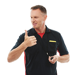 Image showing Whistle, thumbs up and male referee in a studio giving instructions, direction or rules for a match. Sports, fitness and professional man coach with a approval gesture isolated by a white background.