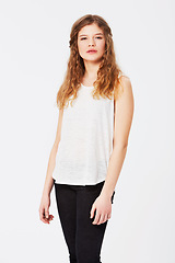 Image showing Fashion, beauty and portrait of a woman in studio with a casual, stylish and trendy outfit. Confident, young and beautiful female model with style, cool and edgy clothes isolated by white background.