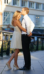 Image showing Man, woman and forehead kiss in city with bonding, care and love on romantic valentines day date. People, happy couple and hug with romance, connection and anniversary celebration on holiday in metro