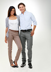 Image showing Couple, love and people standing together looking happy, confident and excited isolated in studio white background. Portrait, man and woman in a relationship in happiness feeling content