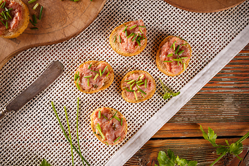 Image showing German teewurst on a slice of bruschetta