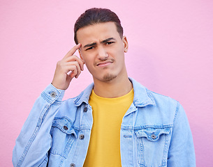 Image showing Confusion, portrait and man with casual outfit, doubt and wonder for future, thinking and mockup on studio background. Face, thoughtful male and gentleman with doubt, contemplation and unsure