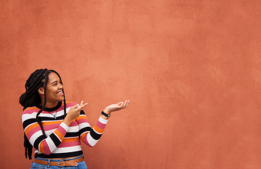 Image showing Mockup, happy or black woman with marketing, product placement or branding space on wall background. Smile or African gen z girl advertising discount deal, sales offer or promotion announcement