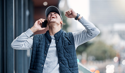 Image showing Winner, phone and man on a balcony celebrating good news with a smile from bonus and promotion. Happiness, yes and mobile call connection of a young person with bokeh celebrate winning or achievement