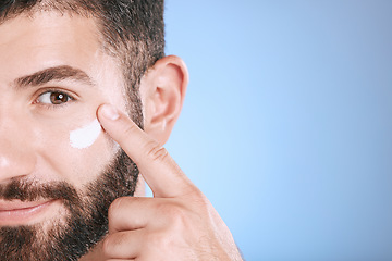 Image showing Face, cream and man with skincare mockup, sunscreen and beauty of clean dermatology on studio background. Male model, portrait and facial lotion for body care cosmetics, wellness or aesthetic mock up