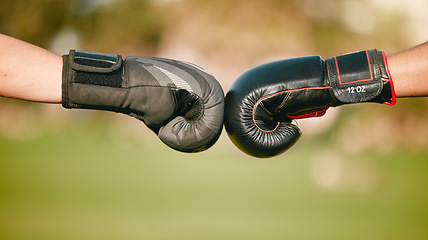 Image showing Boxing, gloves and fist bump with a boxer team outdoor together for sportsmanship, unity or solidarity. Sports, teamwork and motivation with an athlete partnership training in collaboration outside