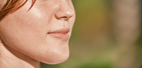 Image showing Mouth, closeup and woman on mockup outdoors on blurred background for advertising and space. Half, face and girl relax on copy space, content and peaceful, natural and calm with product placement