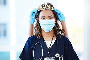 Image showing Crown, face mask and portrait of a woman nurse with an award, achievement or promotion in the hospital. Success, healthcare and female doctor with tiara for celebration, motivation or gift in clinic.