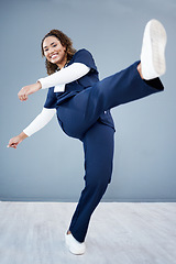 Image showing Kick, healthcare and black woman with celebration, achievement and grey studio background. Portrait, Jamaican female and medical professional with leg in air for happiness, promotion and employee